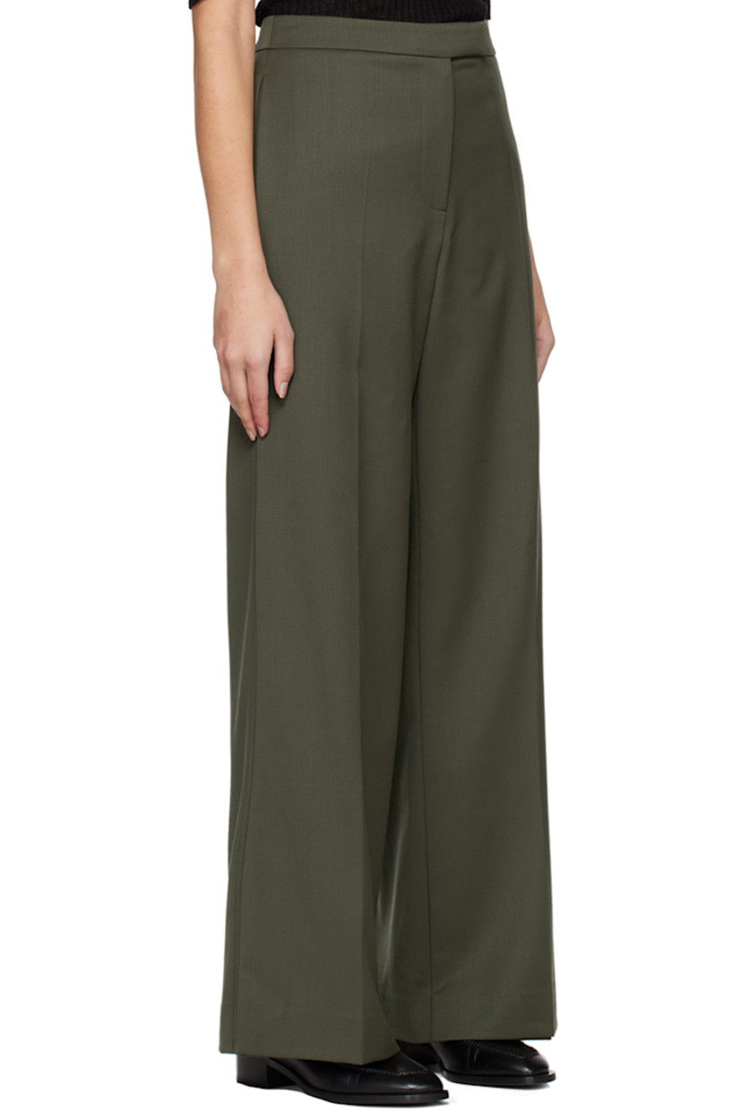 Plain woven stretch wool-blend trousers.

· Layered construction
· Three-pocket styling
· Zip-fly
· Creased legs
· Vent at cuffs

Supplier color: Khaki