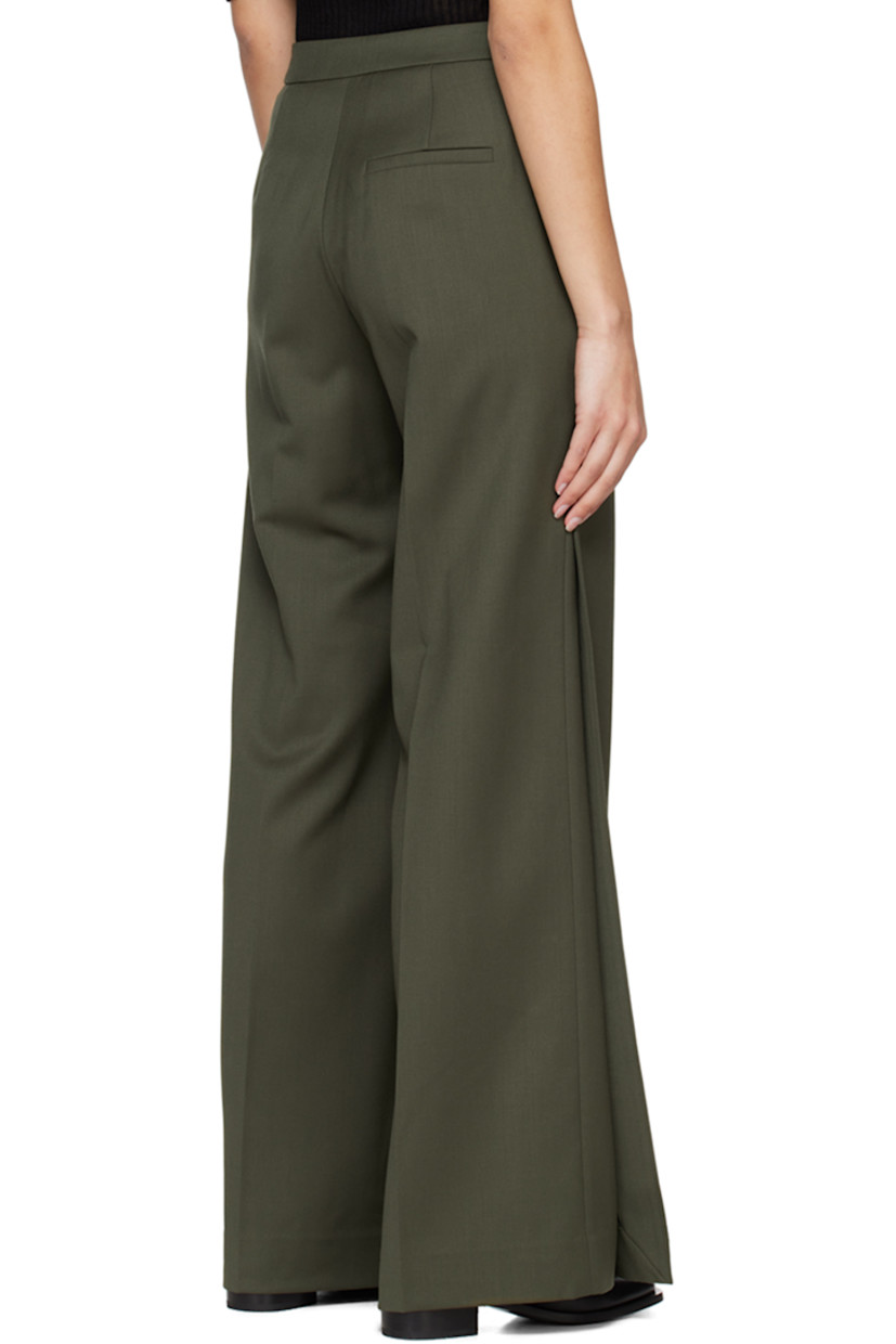 Plain woven stretch wool-blend trousers.

· Layered construction
· Three-pocket styling
· Zip-fly
· Creased legs
· Vent at cuffs

Supplier color: Khaki