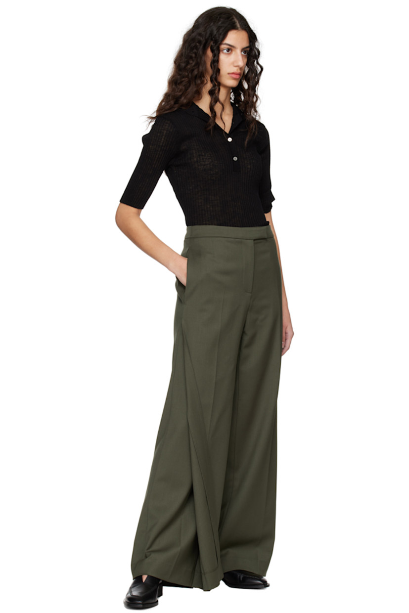 Plain woven stretch wool-blend trousers.

· Layered construction
· Three-pocket styling
· Zip-fly
· Creased legs
· Vent at cuffs

Supplier color: Khaki