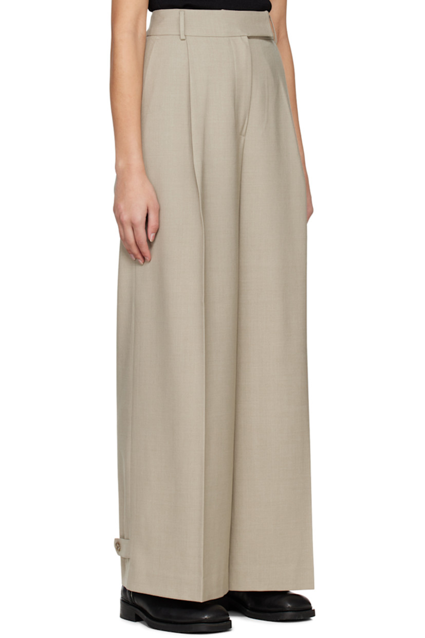 Wool-blend twill trousers.

· Belt loops
· Three-pocket styling
· Zip-fly
· Pleats at front
· Creased legs
· Adjustable button tab at cuffs

Supplier color: Beige