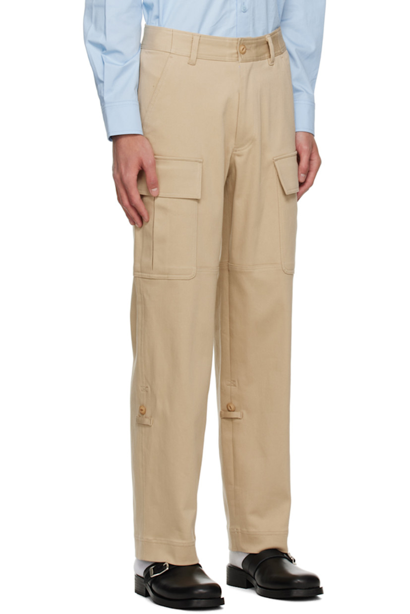 Stretch rayon- and cotton-blend jersey cargo pants.

· Belt loops
· Four-pocket styling
· Zip-fly
· Silver-tone logo hardware at front
· Concealed button tabs at cuffs for alternate styling
· Bellows pockets at outseams

Available exclusively at SSENSE.

Supplier color: Beige