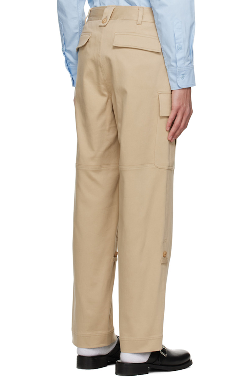 Stretch rayon- and cotton-blend jersey cargo pants.

· Belt loops
· Four-pocket styling
· Zip-fly
· Silver-tone logo hardware at front
· Concealed button tabs at cuffs for alternate styling
· Bellows pockets at outseams

Available exclusively at SSENSE.

Supplier color: Beige