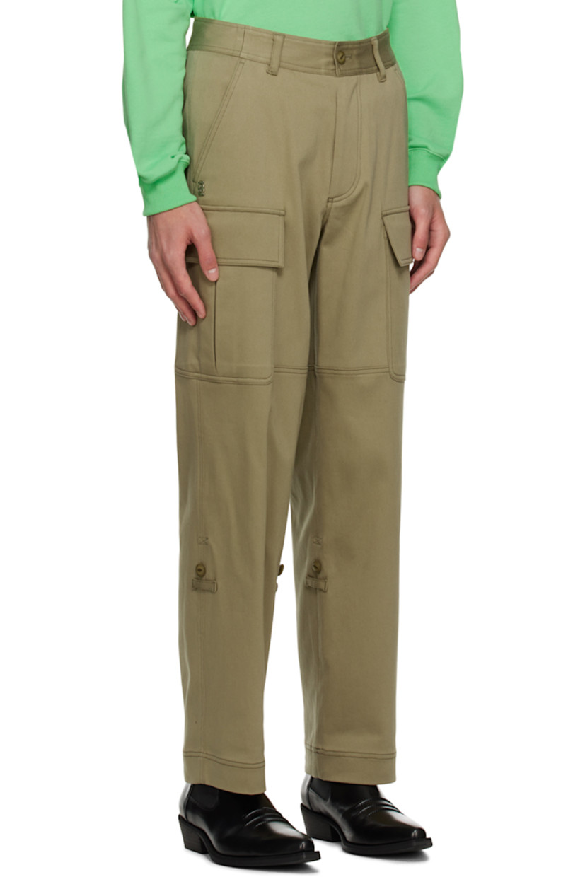 Stretch rayon and cotton-blend jersey cargo pants.

· Belt loops
· Four-pocket styling
· Zip-fly
· Silver-tone logo hardware at front
· Concealed button tabs at cuffs for alternate styling
· Bellows pockets at outseams
· Contrast stitching

Available exclusively at SSENSE.

Supplier color: Khaki