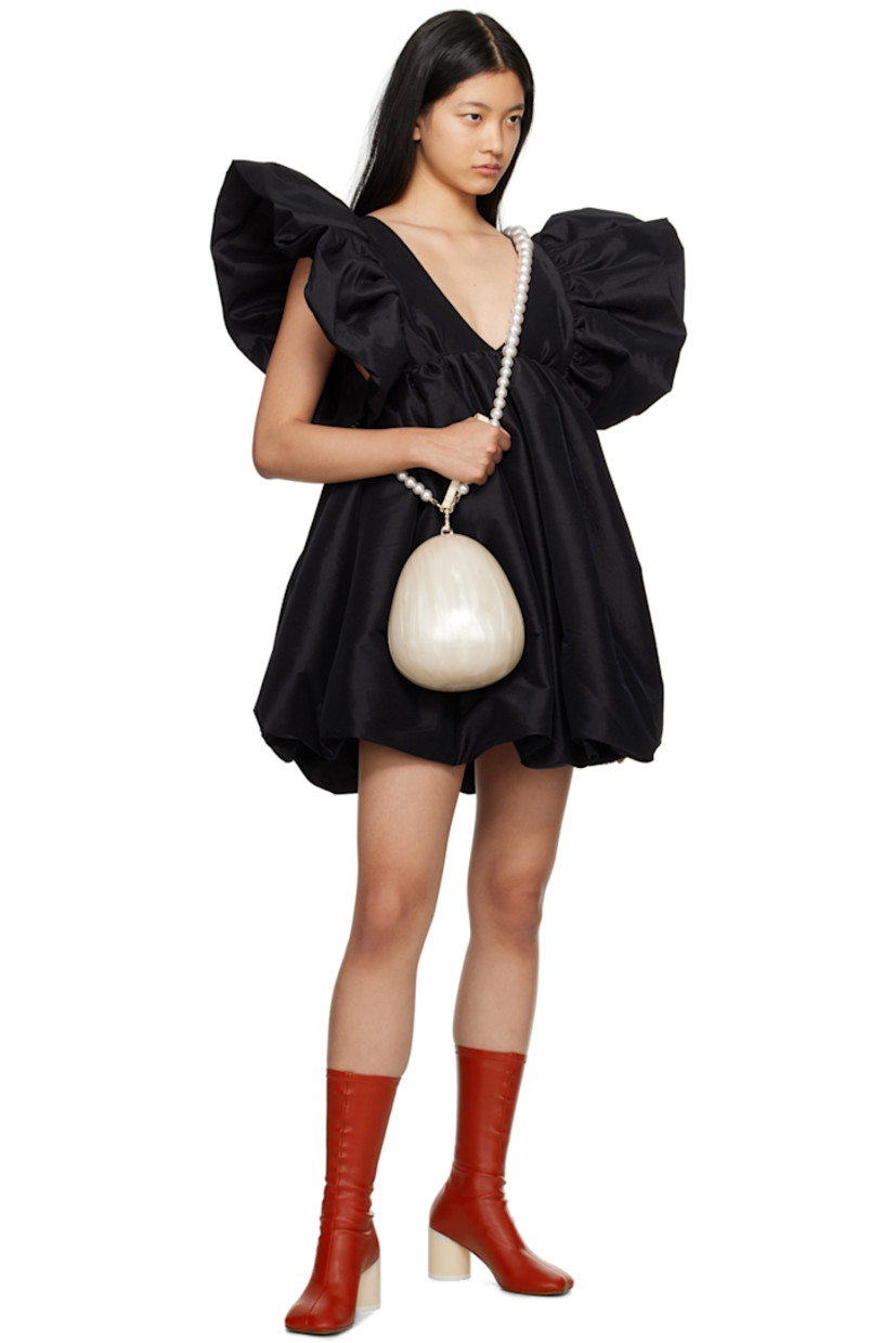 Stretch polyester and nylon-blend taffeta dress. Gathering throughout.

· Plunging V-neck
· Ruffle trim at armscyes 
· Zip closure at low back

Supplier color: Black