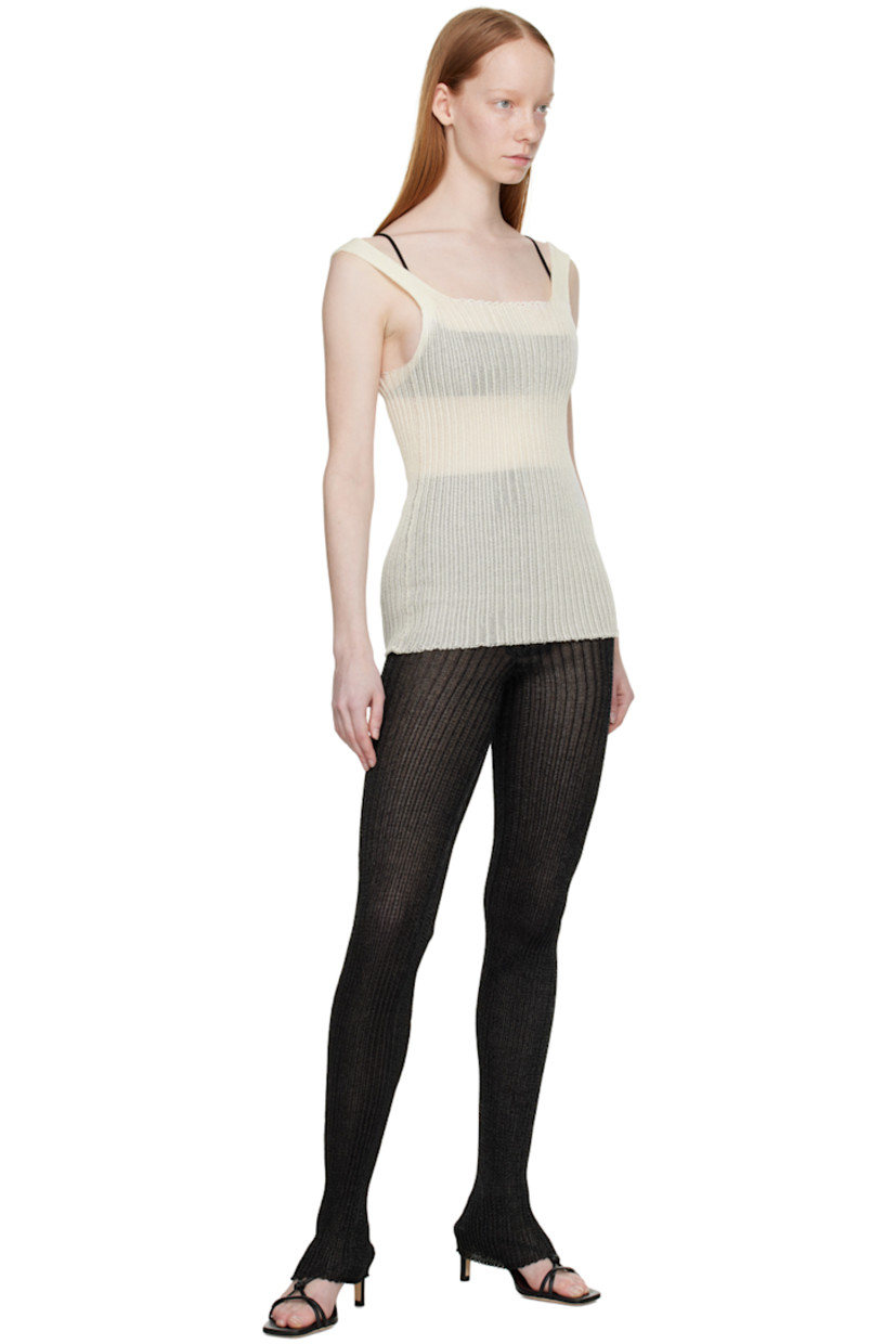 Rib knit cotton and nylon-blend tank top. 

· Raw edges throughout
· Square neck

Supplier color: Ecru