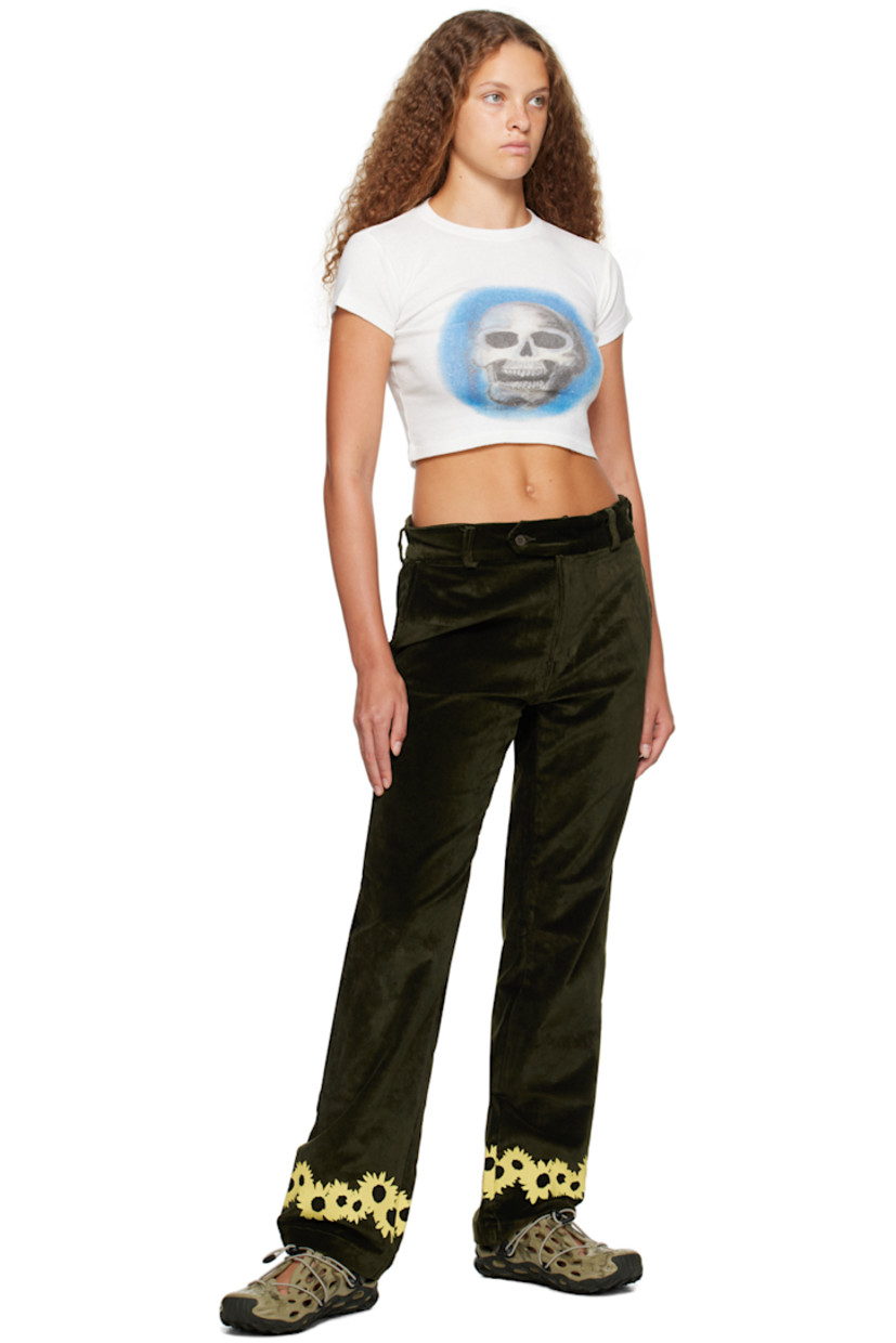 Relaxed-fit stretch cotton-blend velvet trousers.

· Belt loops
· Button tab at waistband
· Five-pocket styling
· Zip-fly
· Logo embroidered at front
· Floral pattern printed at cuffs
· Logo flag at outseam

Supplier color: Moss green