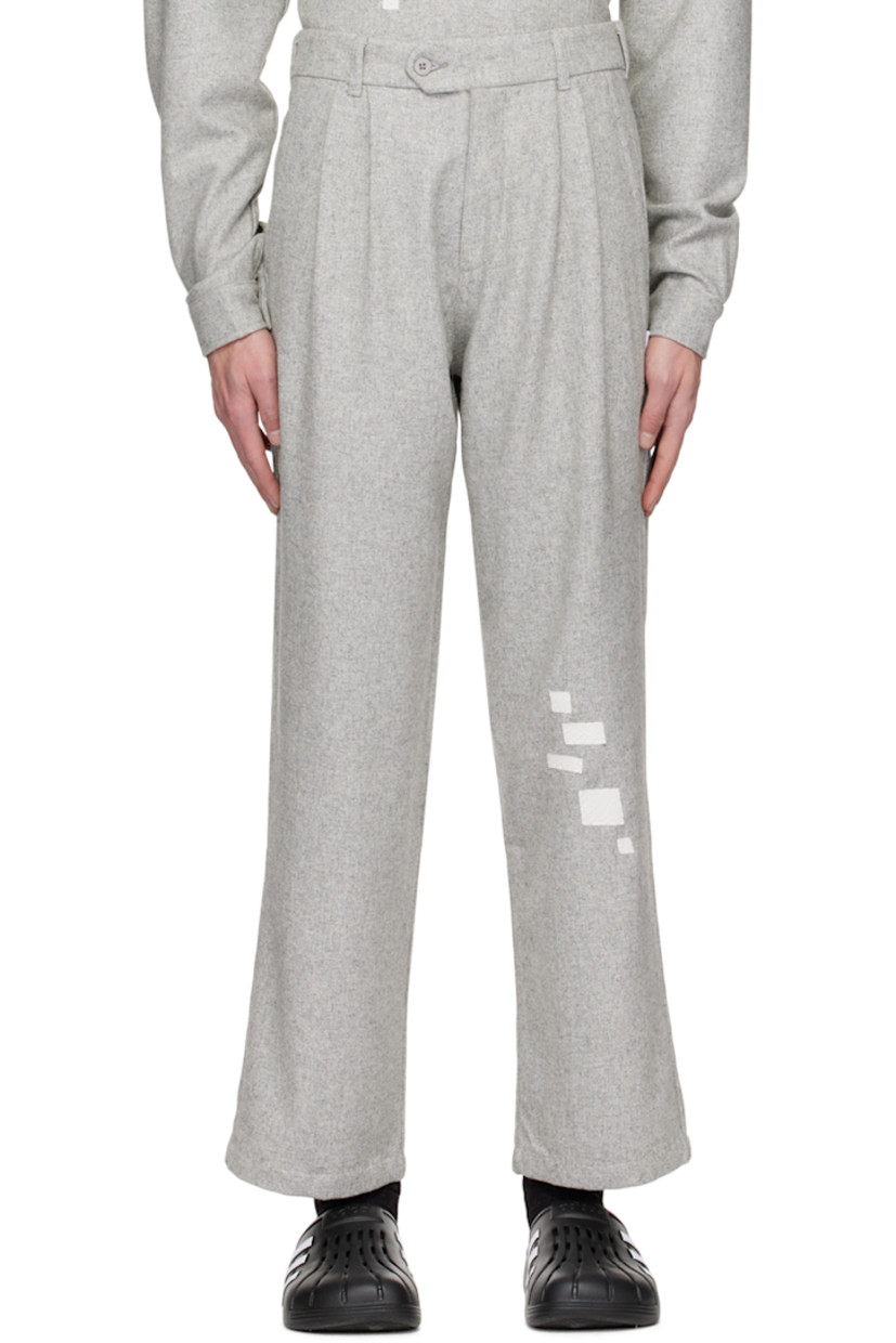 Wool-blend herringbone trousers. 

· Belt loops
· Four-pocket styling
· Zip-fly
· Pleats at front
· Patches at leg
· Logo flag at outseam
· Logo embroidered at back pocket

Supplier color: Gray
