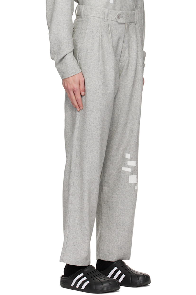 Wool-blend herringbone trousers. 

· Belt loops
· Four-pocket styling
· Zip-fly
· Pleats at front
· Patches at leg
· Logo flag at outseam
· Logo embroidered at back pocket

Supplier color: Gray