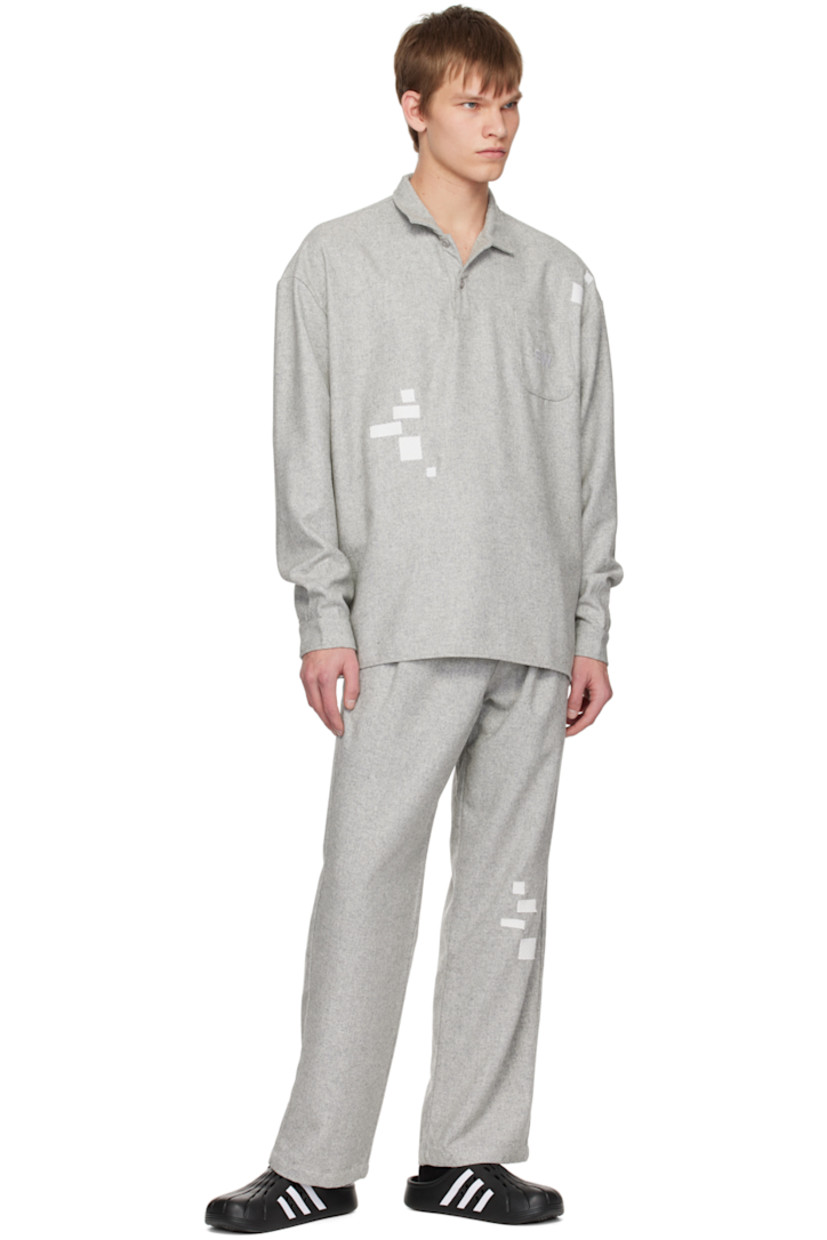 Wool-blend herringbone trousers. 

· Belt loops
· Four-pocket styling
· Zip-fly
· Pleats at front
· Patches at leg
· Logo flag at outseam
· Logo embroidered at back pocket

Supplier color: Gray