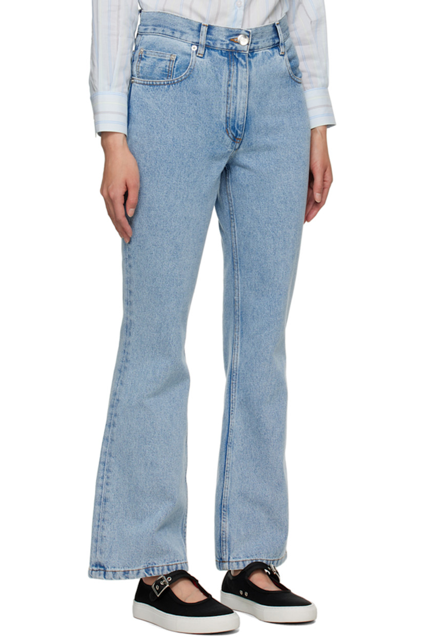 Non-stretch organic cotton denim jeans. Fading throughout. 

· Belt loops 
· Five-pocket styling 
· Zip-fly
· Leather logo patch at back waistband 
· Contrast stitching in brown

Supplier color: Light blue