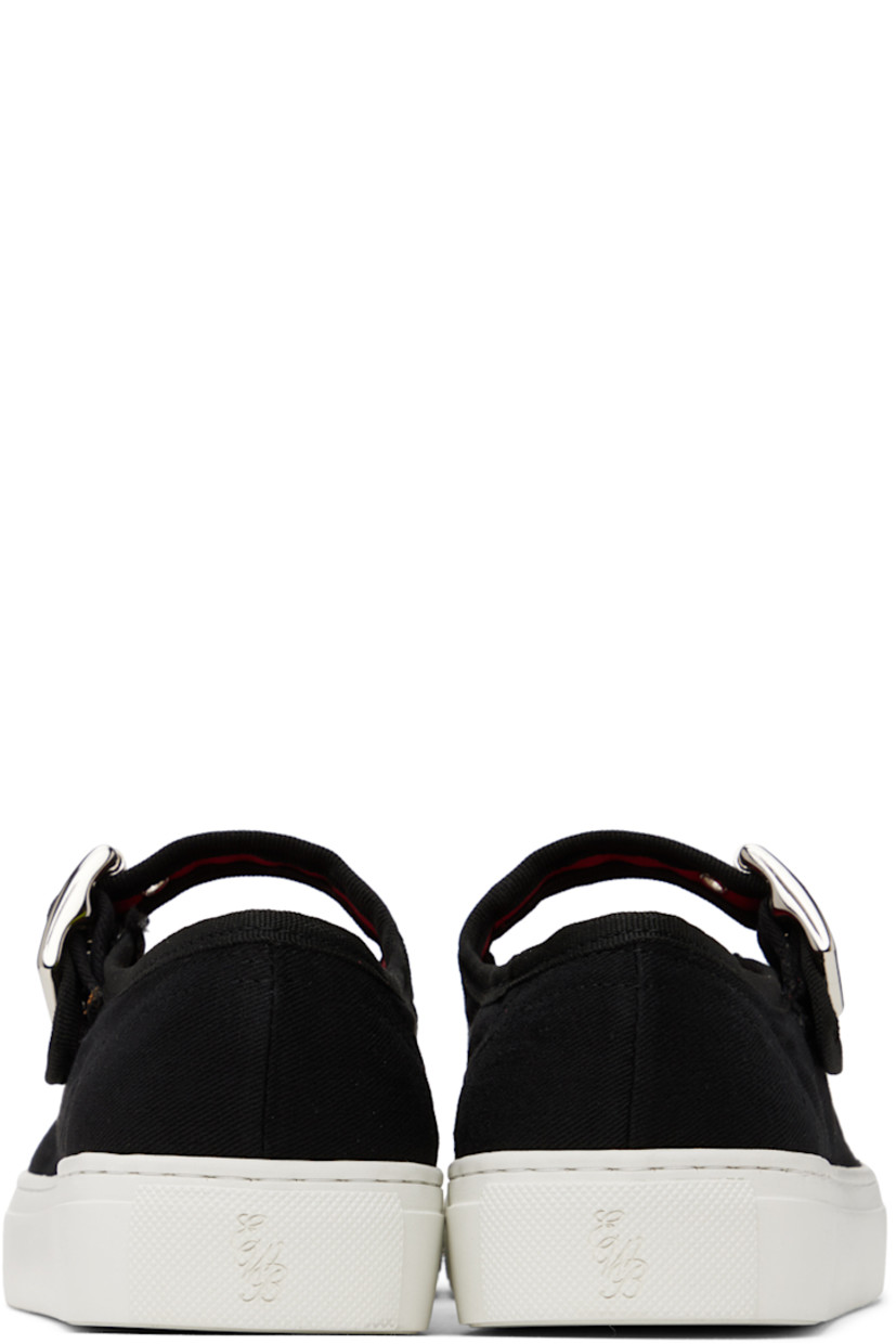 Low-top cotton twill sneakers in black.

· Round toe
· Adjustable pin-buckle strap at vamp
· Eyelet vents at inner side
· Logo embossed at heel
· Textured rubber midsole
· Treaded rubber outsole

Supplier color: Black/White