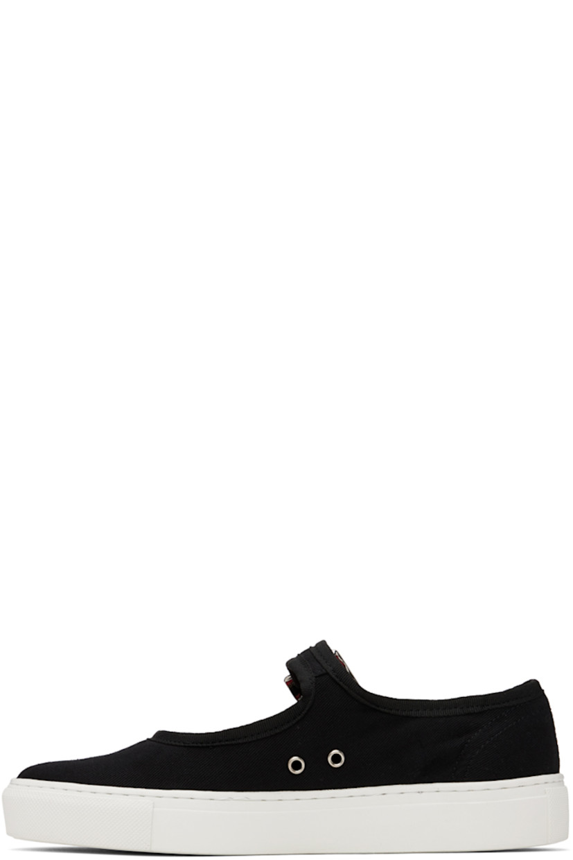 Low-top cotton twill sneakers in black.

· Round toe
· Adjustable pin-buckle strap at vamp
· Eyelet vents at inner side
· Logo embossed at heel
· Textured rubber midsole
· Treaded rubber outsole

Supplier color: Black/White