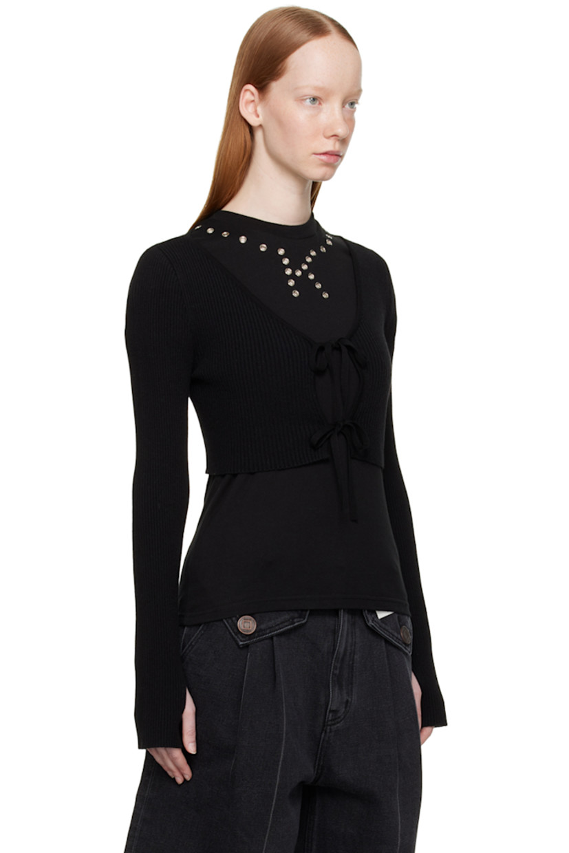 Rib knit rayon-blend cardigan.

· V-neck
· Self-tie straps at open front
· Cropped hem
· Thumbhole at cuffs

Supplier color: Black