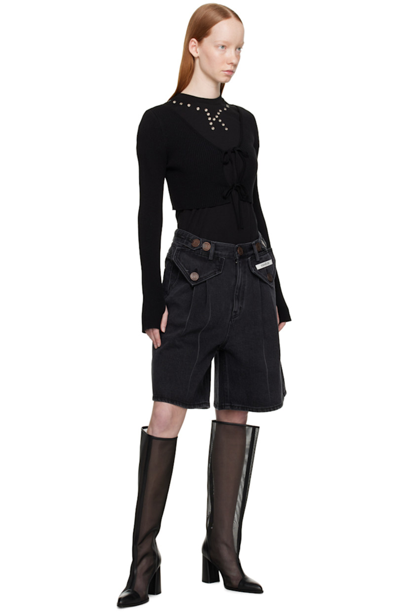 Rib knit rayon-blend cardigan.

· V-neck
· Self-tie straps at open front
· Cropped hem
· Thumbhole at cuffs

Supplier color: Black