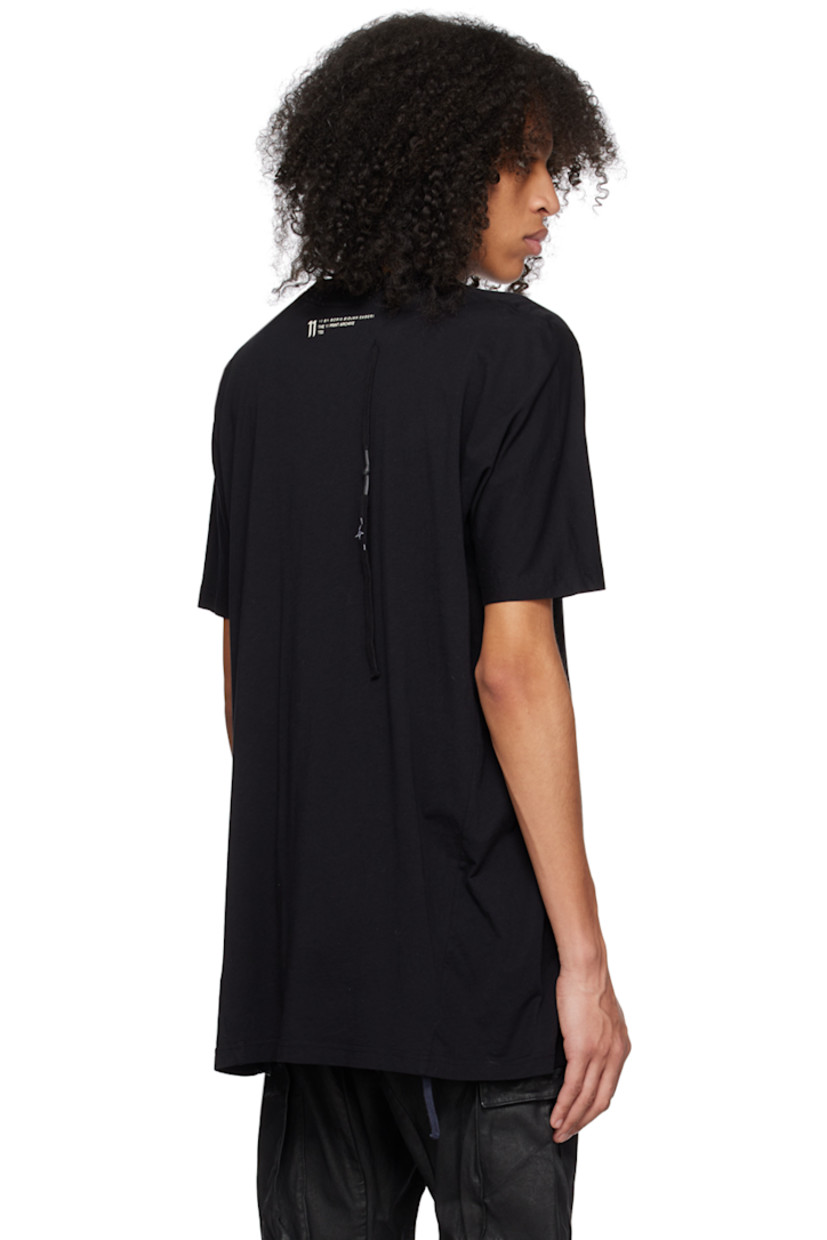 Cotton jersey T-shirt.

· Rib knit crewneck
· Graphic printed at front
· Drawstring and printed logo at back collar

Each item is unique. Please note that coloration may vary.

Supplier color: Black dye