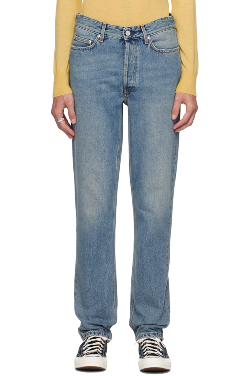 Straight-leg non-stretch organic cotton denim jeans. Distressing and whiskering throughout. 

· Belt loops
· Five-pocket styling
· Button-fly
· Logo patch at back

Supplier color: Original blue