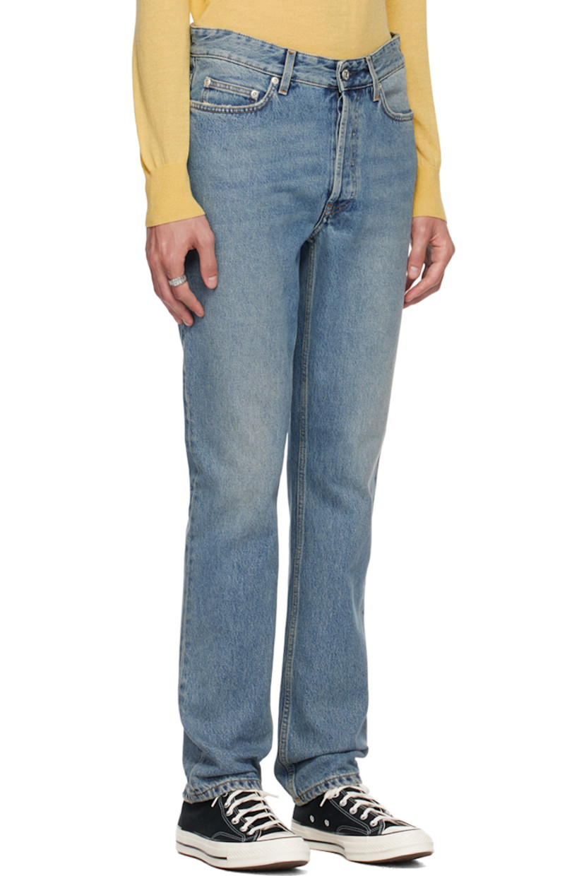 Straight-leg non-stretch organic cotton denim jeans. Distressing and whiskering throughout. 

· Belt loops
· Five-pocket styling
· Button-fly
· Logo patch at back

Supplier color: Original blue