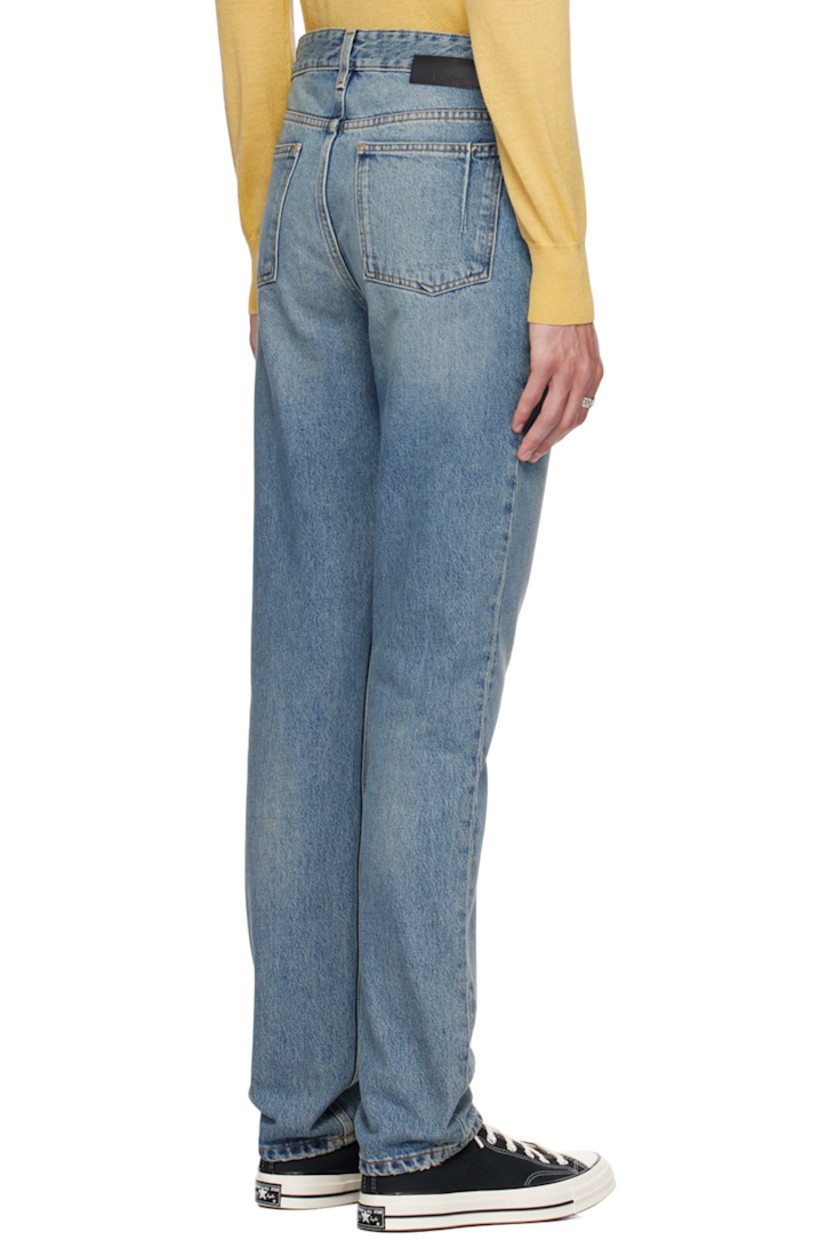 Straight-leg non-stretch organic cotton denim jeans. Distressing and whiskering throughout. 

· Belt loops
· Five-pocket styling
· Button-fly
· Logo patch at back

Supplier color: Original blue