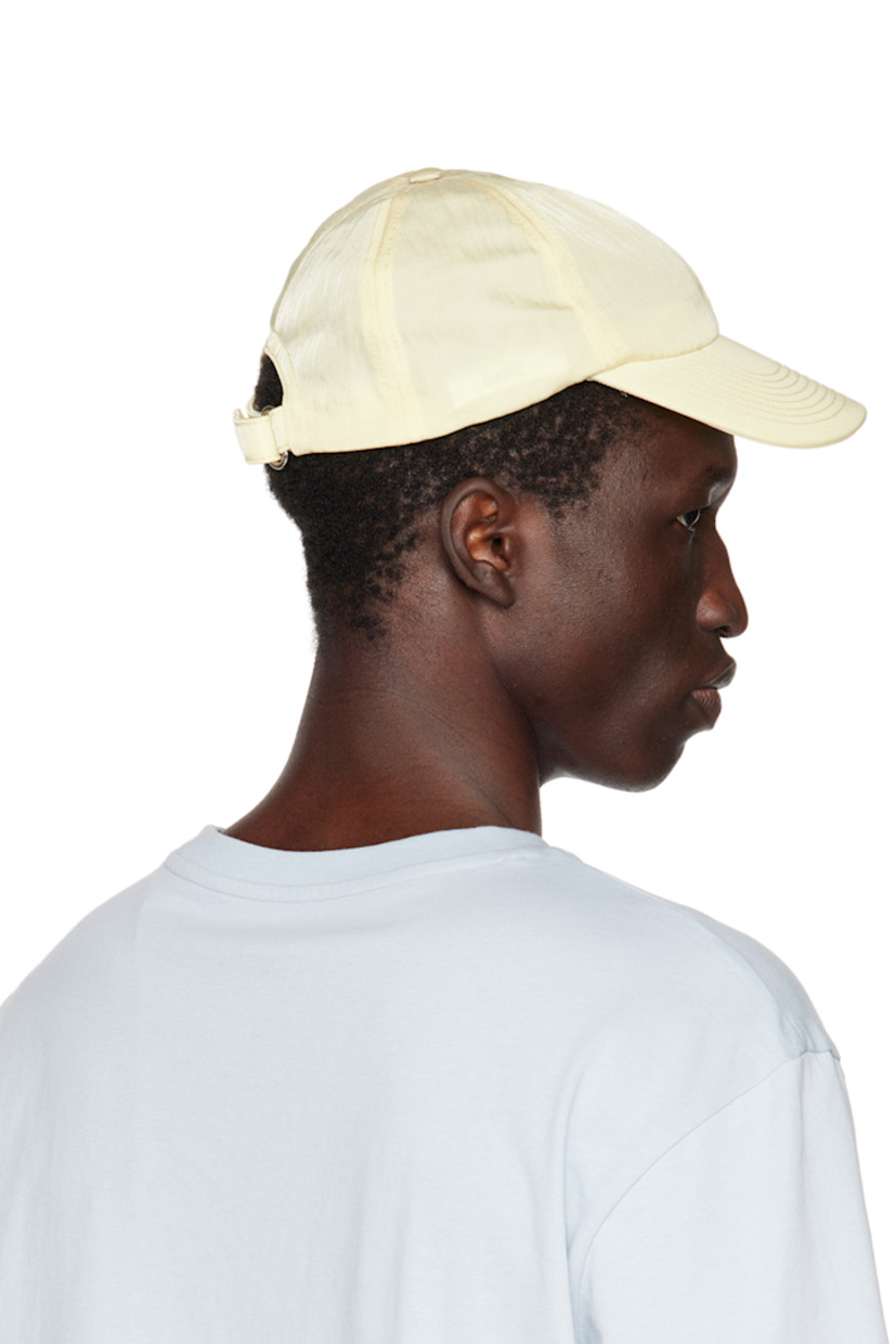 Nylon twill cap.

· Curved brim
· Rubberized logo patch at side
· Press-stud fastening at back face

Supplier color: Sunshine