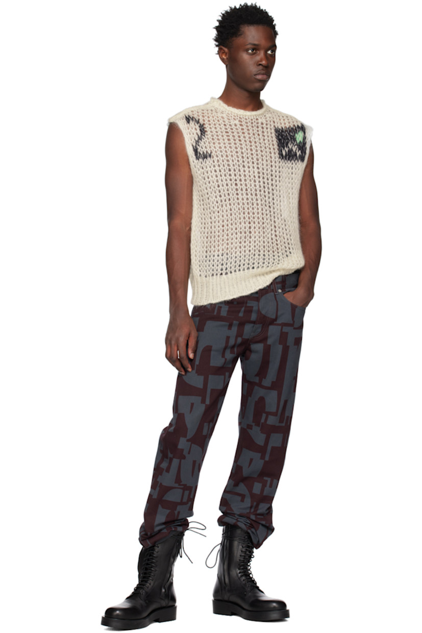 Open knit mohair-blend vest.

· Crewneck 
· Jacquard graphics at chest
· Rib knit hem

Supplier color: Ecru