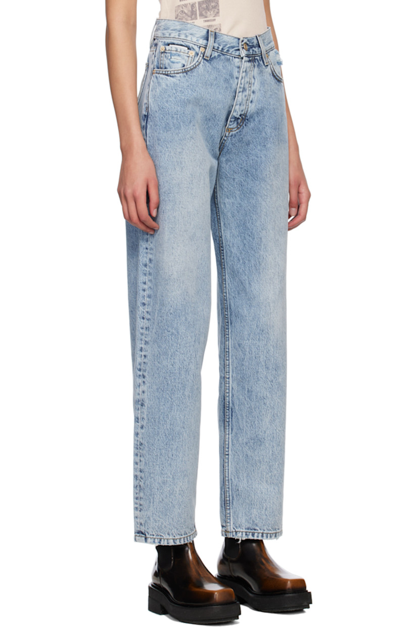 Non-stretch denim jeans. Fading and subtle distressing throughout. 

· Belt loops 
· Five-pocket styling 
· Button-fly 
· Logo patch at coin pocket 
· Rubberized logo patch at back waistband
· Logo graphic embroidered at back pocket
· Contrast stitching in beige 

Supplier color: Light stone