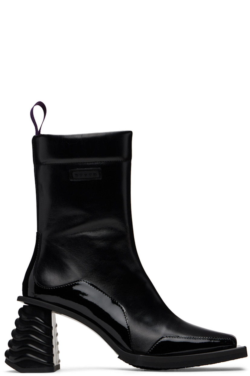 Ankle-high paneled buffed leather and patent leather boots in black. Rubberized logo patch at outer side.

· Square toe
· Webbing pull-loop at padded heel collar
· Zip closure at inner side
· Grained leather lining
· Rubber midsole and block heel
· Treaded rubber outsole
· Heel: H3 in

Supplier color: Black