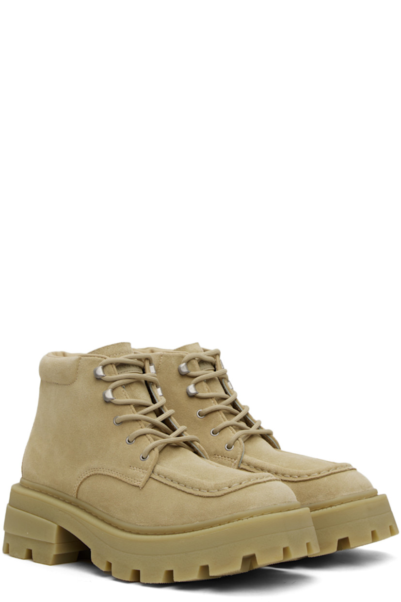 Ankle-high nubuck boots in beige.

· Square moc toe
· Lace-up closure
· Rubberized logo patch at tongue
· Padded collar
· Buffed leather lining
· Textured rubber platform midsole
· Treaded rubber outsole
· Heel: H2.25 in
· Platform: H1.25 in

Supplier color: Gobi