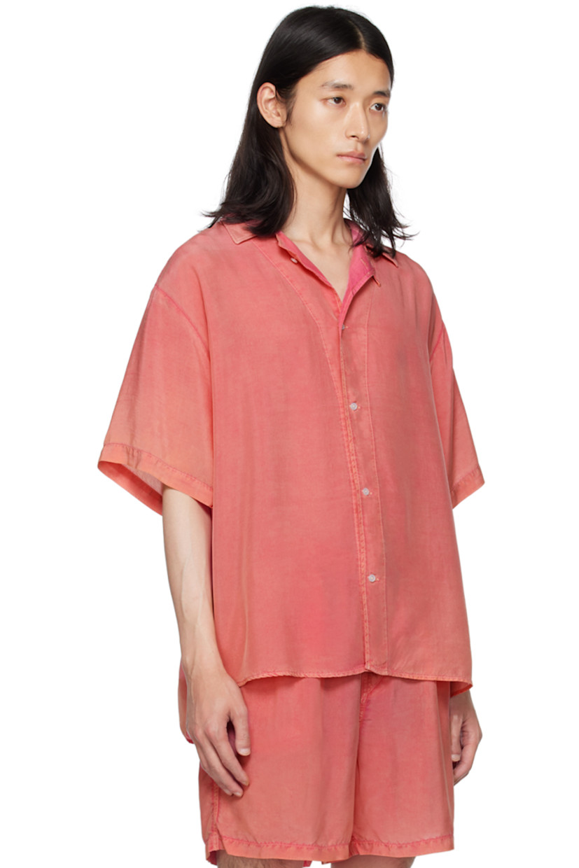 Garment-washed cupro poplin shirt. 

· Open spread collar
· Button closure
· Vented side seams
· Dropped shoulders
· Locker loop at back yoke
· Mother-of-pearl hardware

Supplier color: Pink opal
