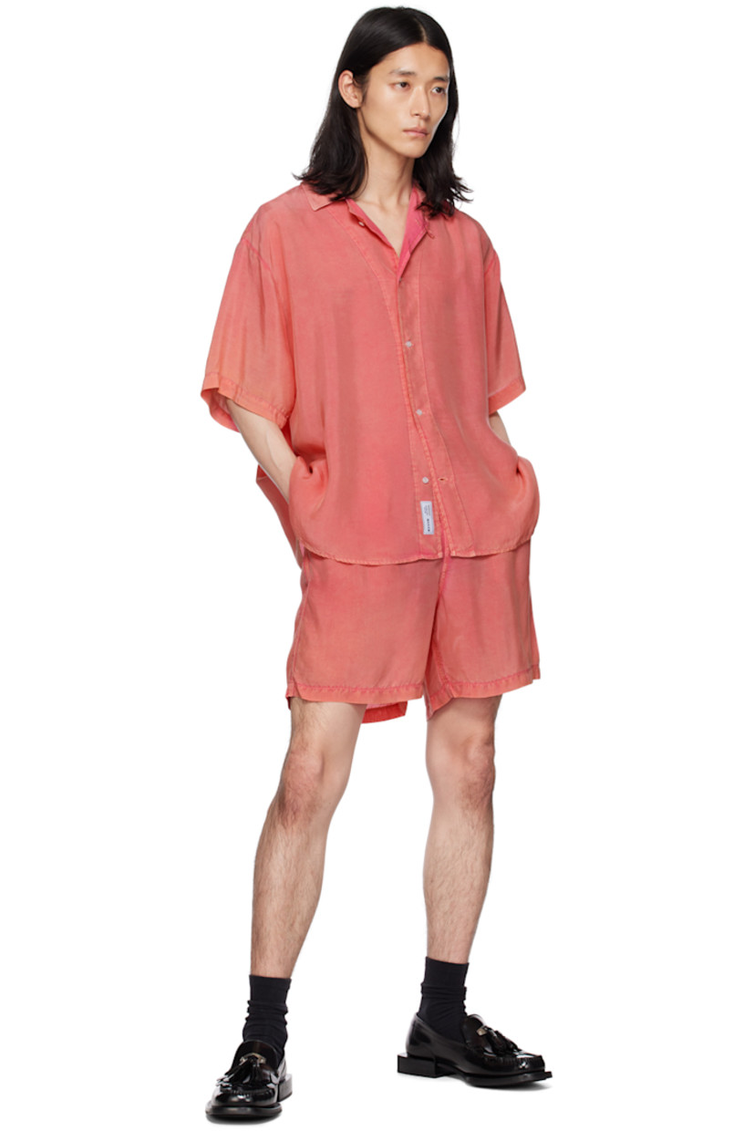 Garment-washed cupro poplin shirt. 

· Open spread collar
· Button closure
· Vented side seams
· Dropped shoulders
· Locker loop at back yoke
· Mother-of-pearl hardware

Supplier color: Pink opal