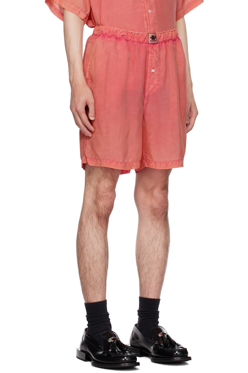 Garment-washed cupro poplin shorts. 

· Rubberized logo patch at elasticized waistband 
· Three-pocket styling
· Button-fly
· Grosgrain pull-loop at back

Supplier color: Pink opal