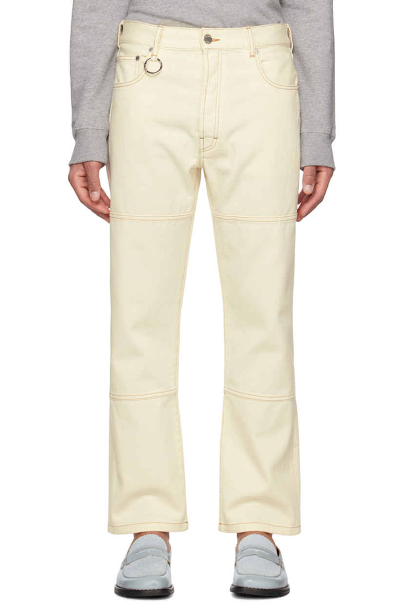 Straight-leg non-stretch organic denim jeans.

· Mid-rise
· Belt loops
· O-ring hardware at front
· Five-pocket styling
· Button-fly
· Leather logo patch at back waistband
· Contrast stitching

Supplier color: Off-white