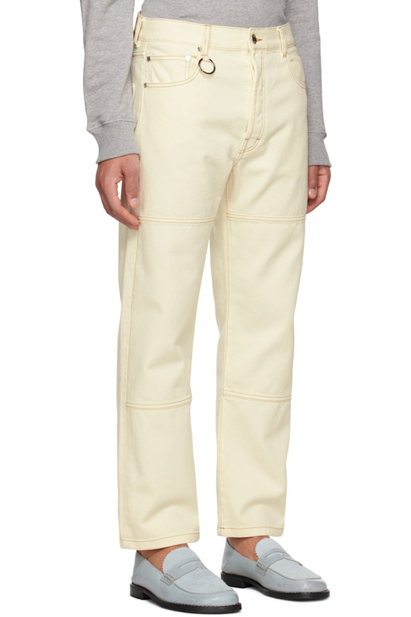 Straight-leg non-stretch organic denim jeans.

· Mid-rise
· Belt loops
· O-ring hardware at front
· Five-pocket styling
· Button-fly
· Leather logo patch at back waistband
· Contrast stitching

Supplier color: Off-white