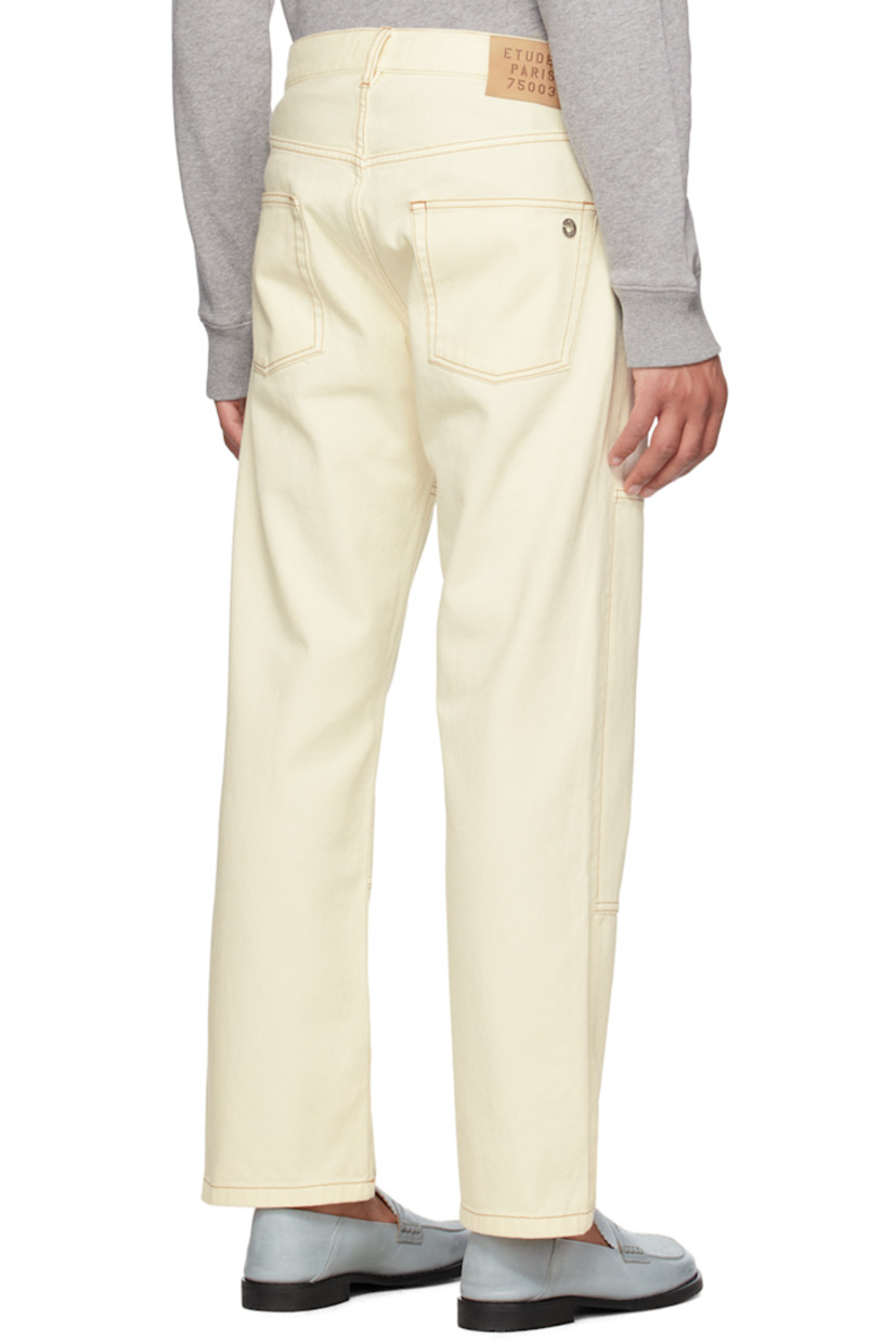 Straight-leg non-stretch organic denim jeans.

· Mid-rise
· Belt loops
· O-ring hardware at front
· Five-pocket styling
· Button-fly
· Leather logo patch at back waistband
· Contrast stitching

Supplier color: Off-white