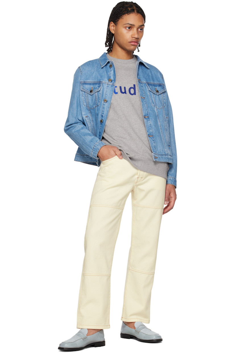 Straight-leg non-stretch organic denim jeans.

· Mid-rise
· Belt loops
· O-ring hardware at front
· Five-pocket styling
· Button-fly
· Leather logo patch at back waistband
· Contrast stitching

Supplier color: Off-white