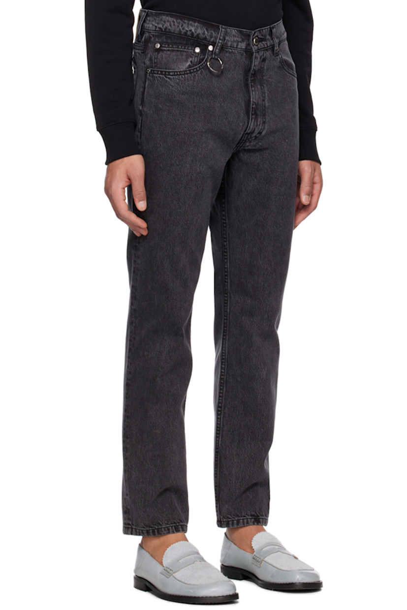 Slim-fit non-stretch organic denim jeans. Fading throughout.

· Mid-rise
· Belt loops
· O-ring hardware at front
· Five-pocket styling
· Zip-fly
· Leather logo patch at waistband

Supplier color: Black