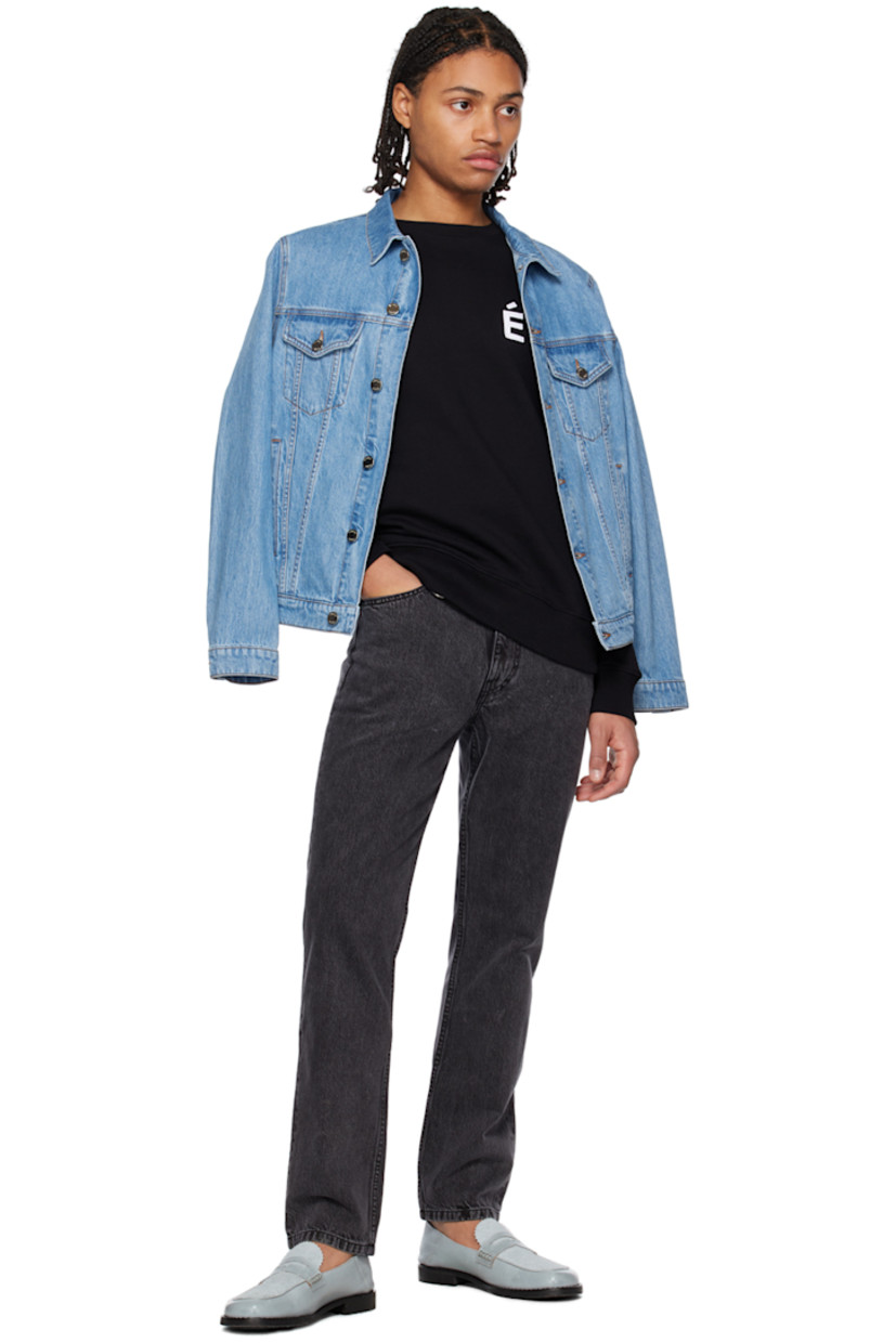 Slim-fit non-stretch organic denim jeans. Fading throughout.

· Mid-rise
· Belt loops
· O-ring hardware at front
· Five-pocket styling
· Zip-fly
· Leather logo patch at waistband

Supplier color: Black