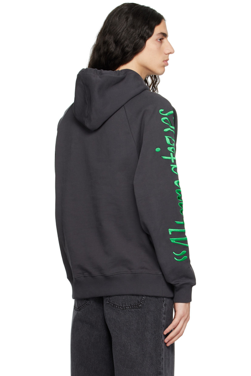 Organic cotton French terry hoodie. 

· Drawstring at hood
· Logo graphic embroidered at front
· Kangaroo pocket
· Rib knit hem and cuffs
· Text embroidered at raglan sleeves

Supplier color: Black