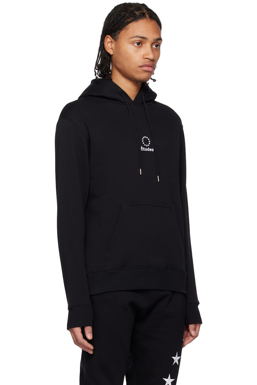 Organic cotton fleece hoodie.

· Drawstring at hood
· Logo embroidered at front
· Kangaroo pocket
· Rib knit hem and cuffs

Supplier color: Black