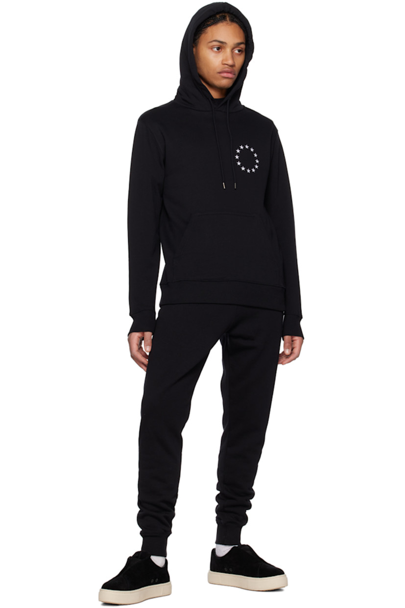 Organic cotton fleece hoodie.

· Drawstring at hood
· Logo embroidered at chest and back
· Kangaroo pocket
· Rib knit hem and cuffs

Supplier color: Black