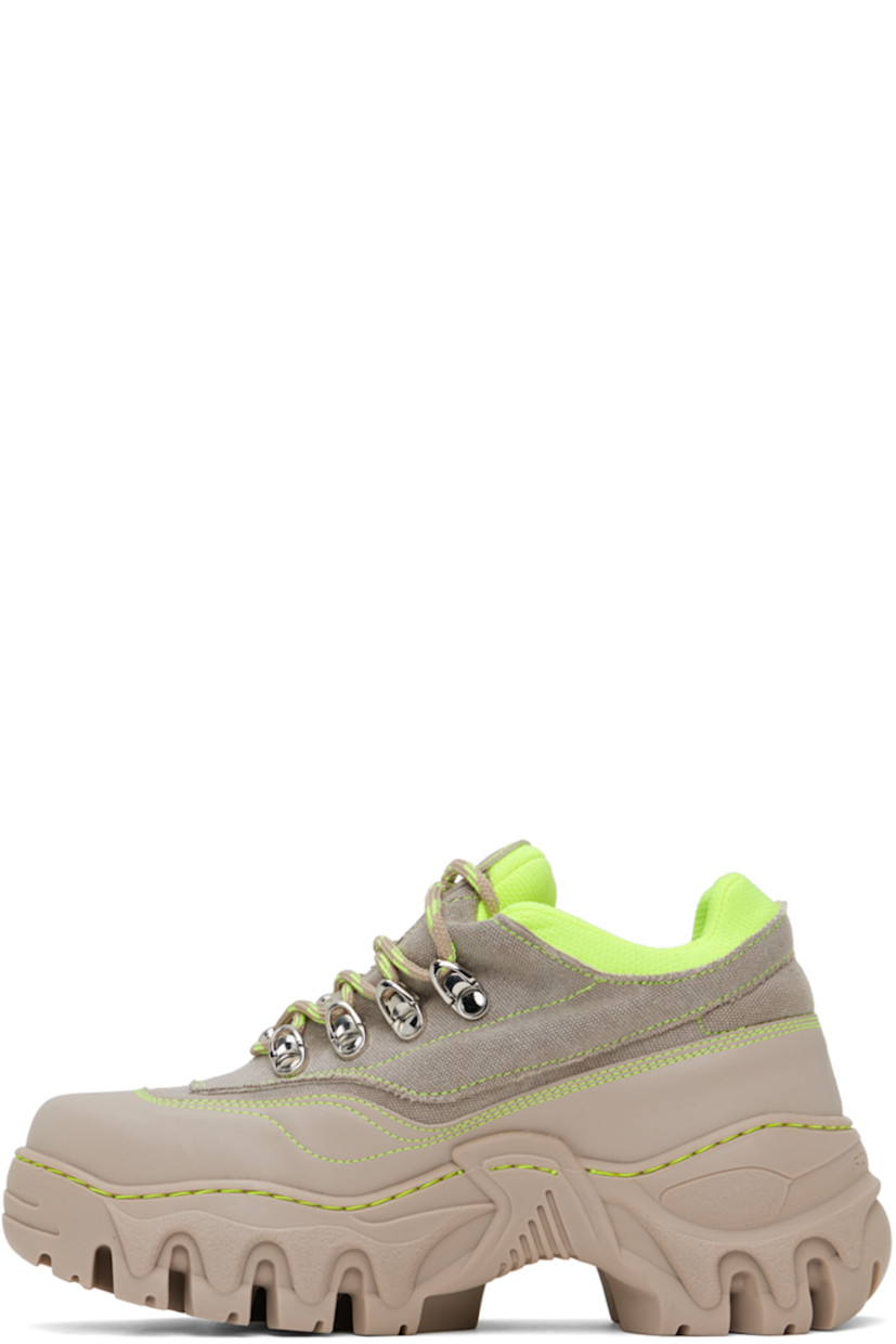 Handcrafted low-top paneled canvas and buffed faux-leather sneakers in beige.

· Lace-up closure
· Logo patch at padded tongue
· Padded collar
· Rubberized logo patch at outer side
· Logo embossed at heel counter
· Sculptural TPU platform midsole
· Treaded TPU outsole
· Platform: H2 in

Supplier color: Desert