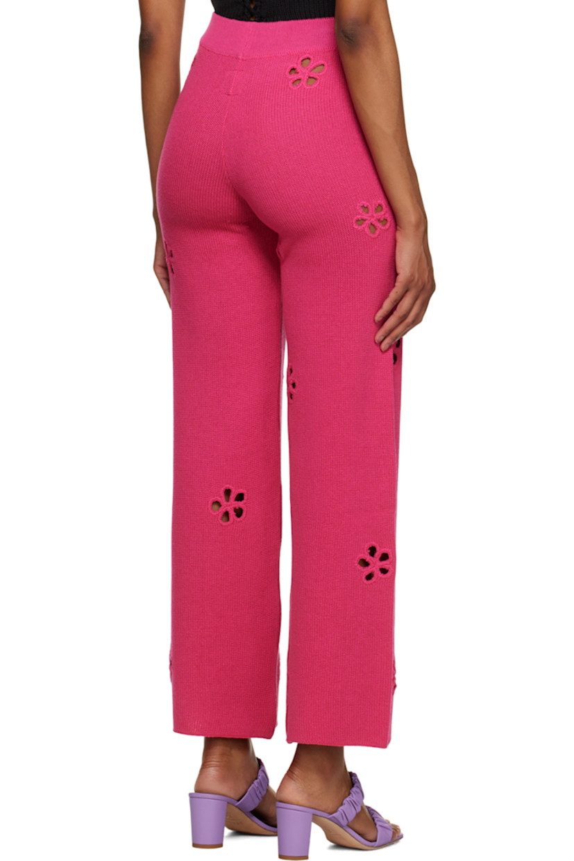 Handcrafted knit cotton- and acrylic-blend lounge pants. 

· Floral cutouts throughout
· Elasticized rib knit waistband

Supplier color: Magenta