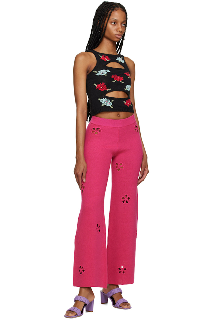Handcrafted knit cotton- and acrylic-blend lounge pants. 

· Floral cutouts throughout
· Elasticized rib knit waistband

Supplier color: Magenta