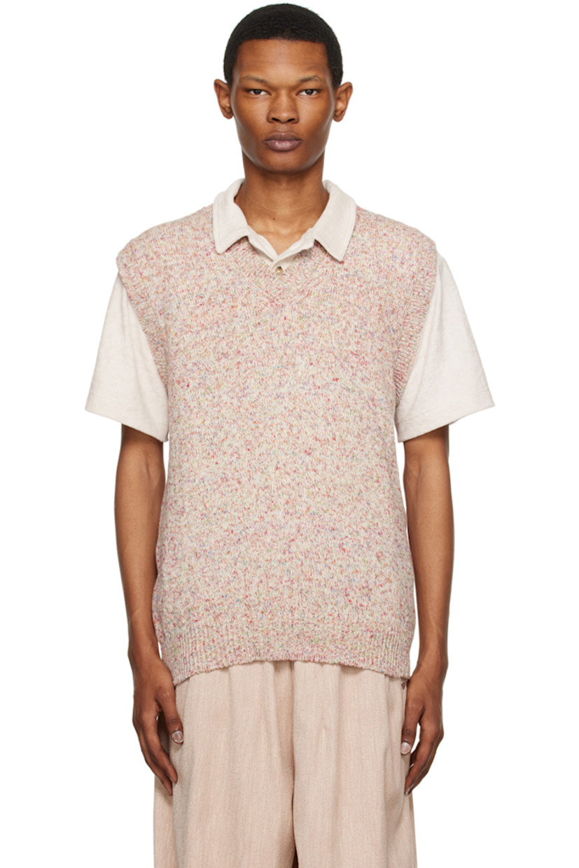 Mottled knit cotton-blend vest. Rib knit V-neck, hem, and armscyes.

Supplier color: Paradise mix