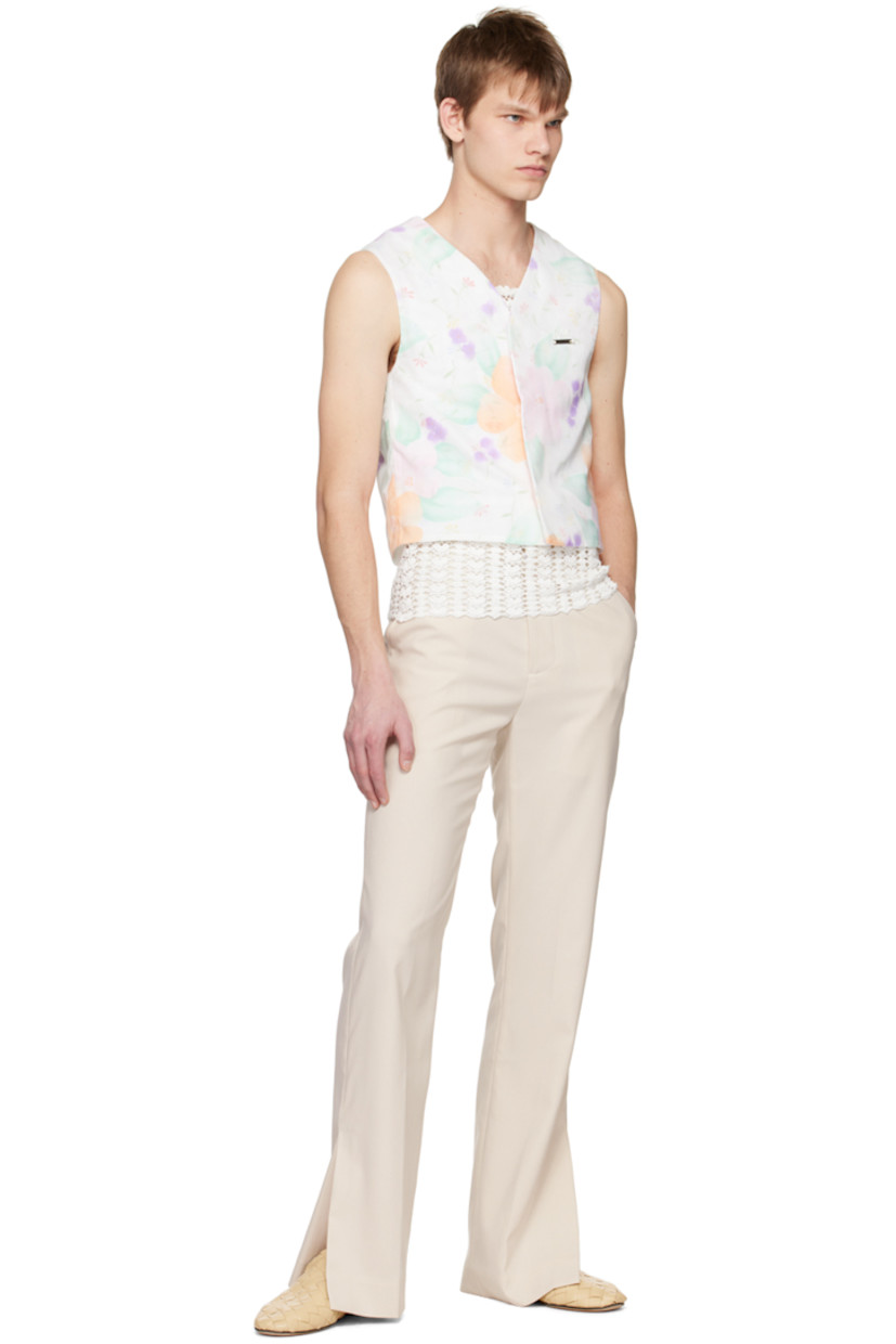 Polyester chiffon and plain-woven cotton vest. Fil-coupé and floral pattern printed throughout.

· Layered construction
· Y-neck
· Concealed magnetic press-stud closure
· Logo plaque with embroidered and embellished detailing at chest

Supplier color: Flower