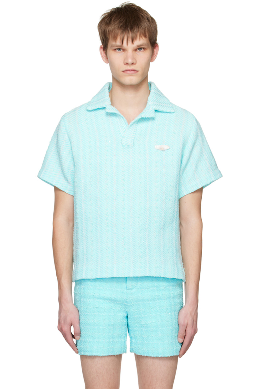 Handcrafted woven cotton- and polyester-blend polo. Sequin detailing and stripe pattern throughout.

· Open spread collar
· Open placket
· Logo-printed shell hardware at chest
· Vented side seams

Supplier color: Blue stripe