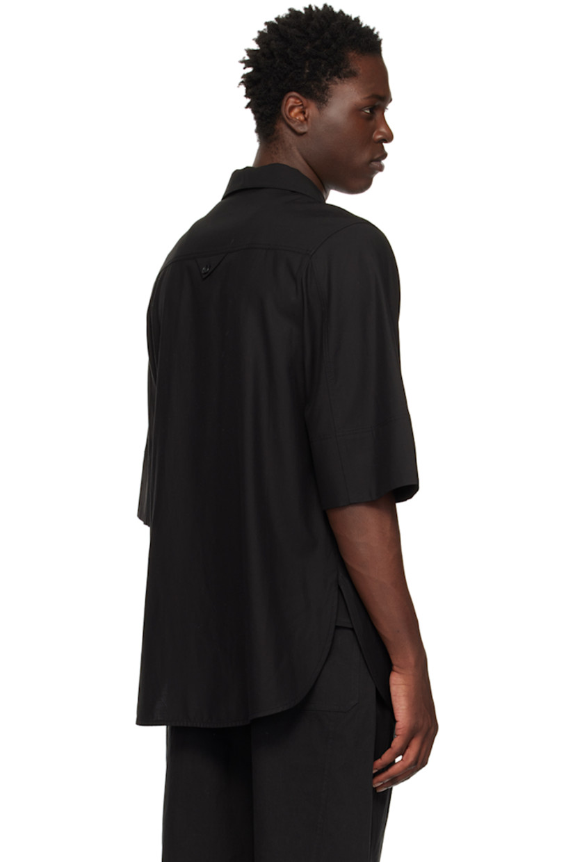 Rayon- and cotton-blend twill shirt. 

· Spread collar
· Button closure
· Patch pocket
· Shirttail hem

Available exclusively at SSENSE.

Supplier color: Black