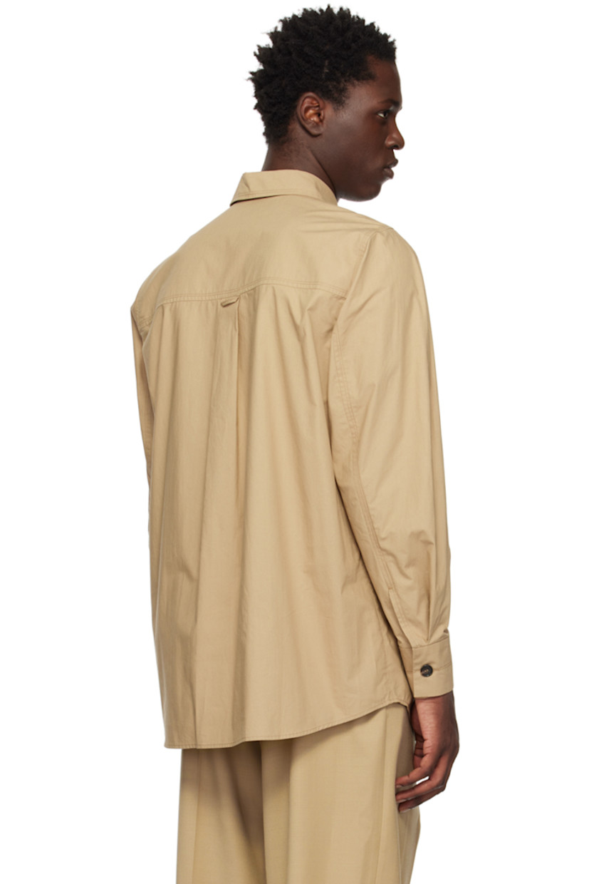 Cotton poplin shirt. 

· Spread collar
· Button closure
· Shirttail hem 
· Single-button barrel cuffs

Available exclusively at SSENSE.

Supplier color: Incense