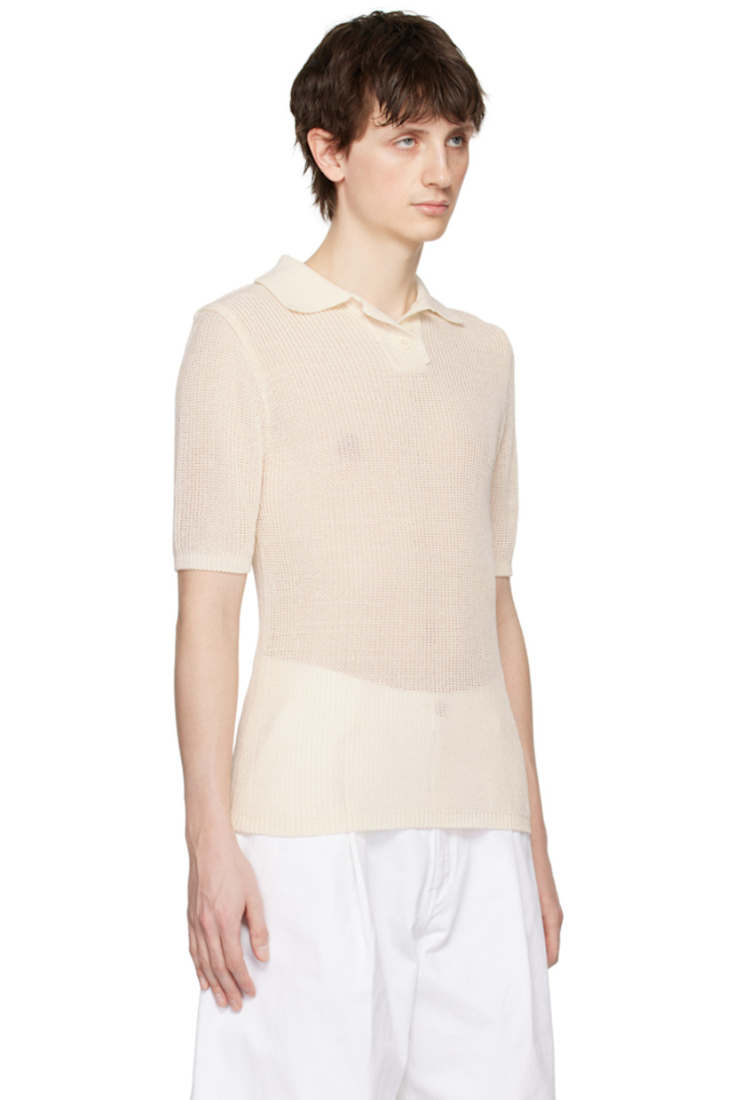 Semi-sheer rib knit rayon-blend polo.

· Spread collar
· Three-button placket
· Mother-of-pearl hardware

Supplier color: Cream