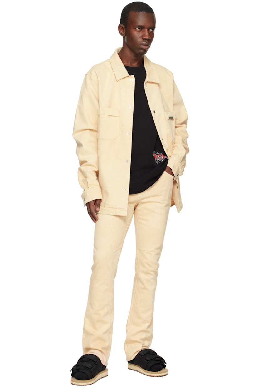 Stretch denim shirt.

· Spread collar
· Press-stud closure
· Logo hardware at chest
· Patch pockets
· Single-button barrel cuffs
· Logo-engraved silver-tone hardware

Supplier color: Oatmeal