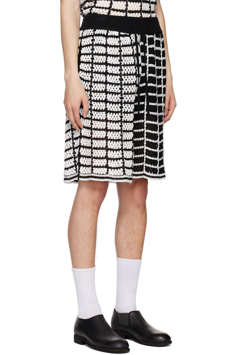Crocheted tencel shorts. Check pattern throughout.

· Drawstring at rib knit waistband
· Two-pocket styling
· Vented outseams
· Partially lined

Supplier color: Black contrast
